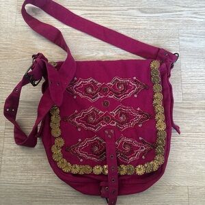 Elegant Fuchsia Crossbody Bag with Brass Details